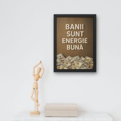 Imagine în ramă neagră cu text „Banii sunt energie bună” pentru decor modern